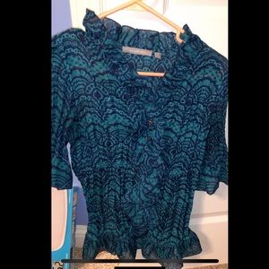 Navy blue/green ruffled blouse.